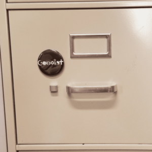 coexist magnet on cabinet
