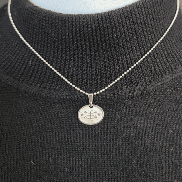 Two-sided silver pendant with 16" ball chain