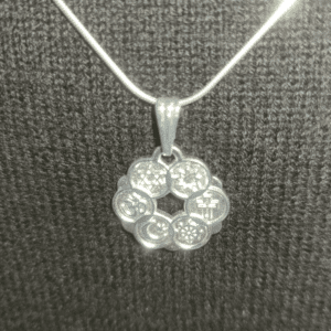 Closeup of Smaller Interfaith Pendant on Sterling Silver Snake Chain