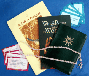 books and prayer beads