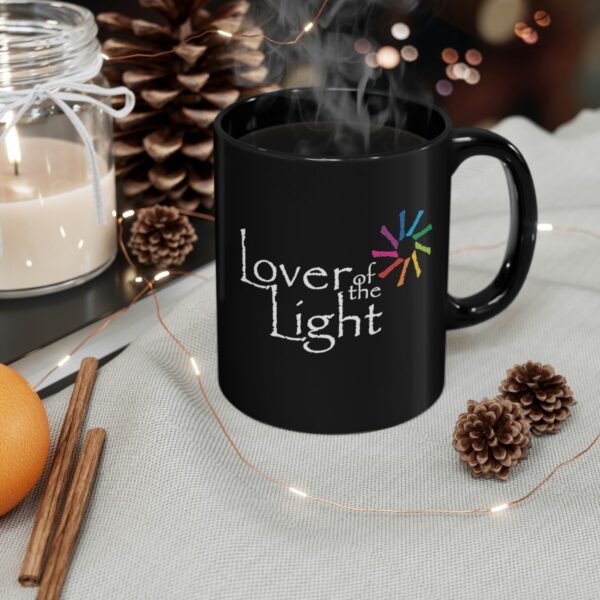 Lover of the Light Mug on table