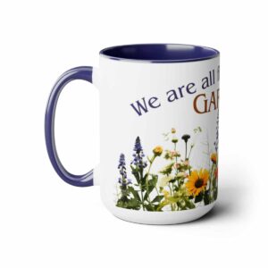 We are all flowers of one Garden 15 oz coffee mug with Blue handle and interior