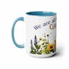 We are all flowers of one Garden 15 oz coffee mug with Light Blue handle and interior