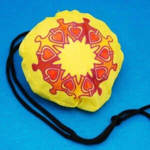 The drawstring cord allows you to attach the bag to a purse or computer bag.