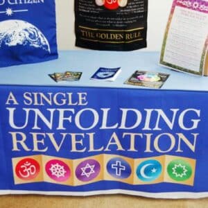 Laying a table cloth over the top edge gives a clean look and holds it in place.